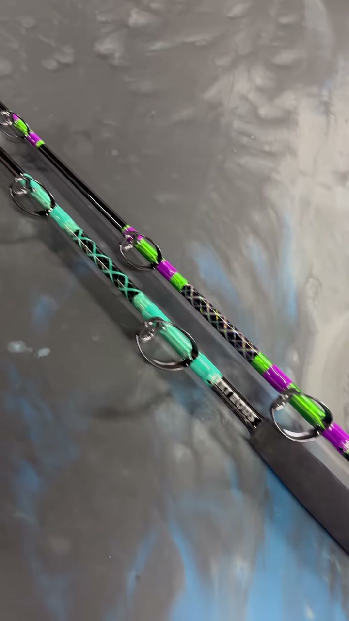 Close detail of a green and purple decorative cross wrap running through the guides